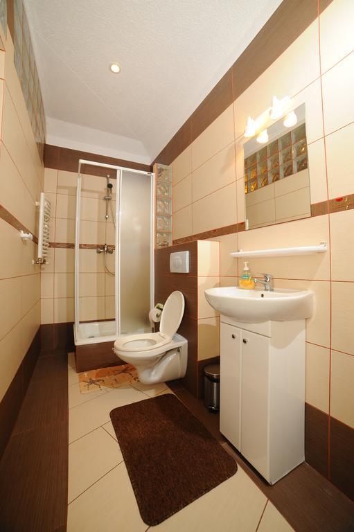 Apartamenty W Jantar - Lilasun シクラルスカ・ポレンバ 部屋 写真